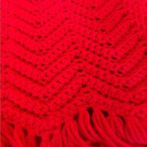 Like new handmade bright red chevron crochet blanket. No flaws. The pop of red!
